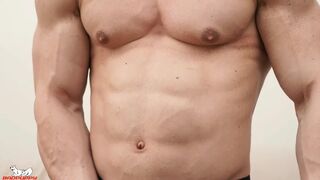 Zahn pulls his hard, uncut cock from his underwear