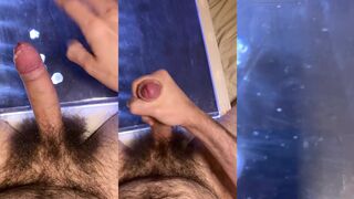 Very hairy big white uncut dick jerking off and cumming on a glowing light table