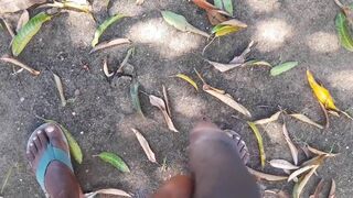 Pissing in the street through the garden