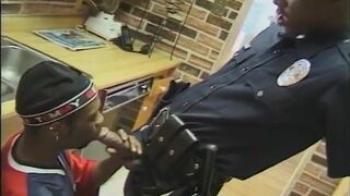 Black Police Guy Sucks a Dude and Bangs His Ass in the Kitchen