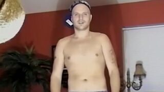 Muscly white masculine guy watches porn and jerks off his dick