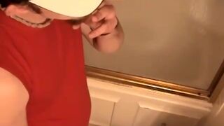 Perverted young man plays with his tool while smoking a cig