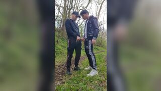Two hot, horny boys smoking and wanking their dicks outdoors