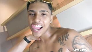 Slim tattooed boy gets a handjob to his big dick