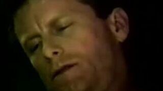 Two straight working men put condoms on