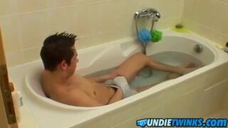 Sexy brunette twink Cristian jacking off and taking a shower