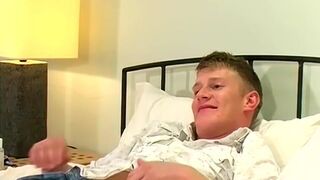 Blond British jock Michael B jerks off his dick and cums