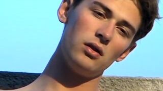 Naughty twink Shane Allen smokes cigars and teases cock solo