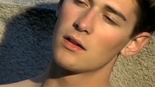 Naughty twink Shane Allen smokes cigars and teases cock solo