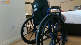 Handicapped guy wheels around hotel room naked in wheelchair