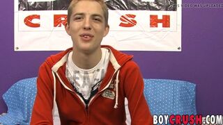 Smiling young homo jerks off and shoots his load out