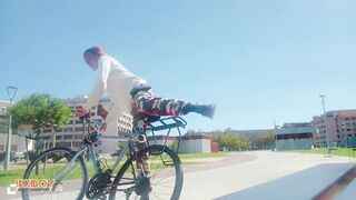 Young Man with His Bicycle Pees