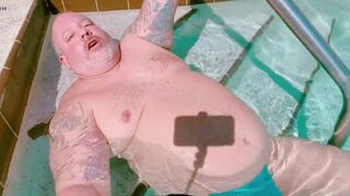 FATTEST DADDY BELLY IN A POOL ! Jacks his cock, too!
